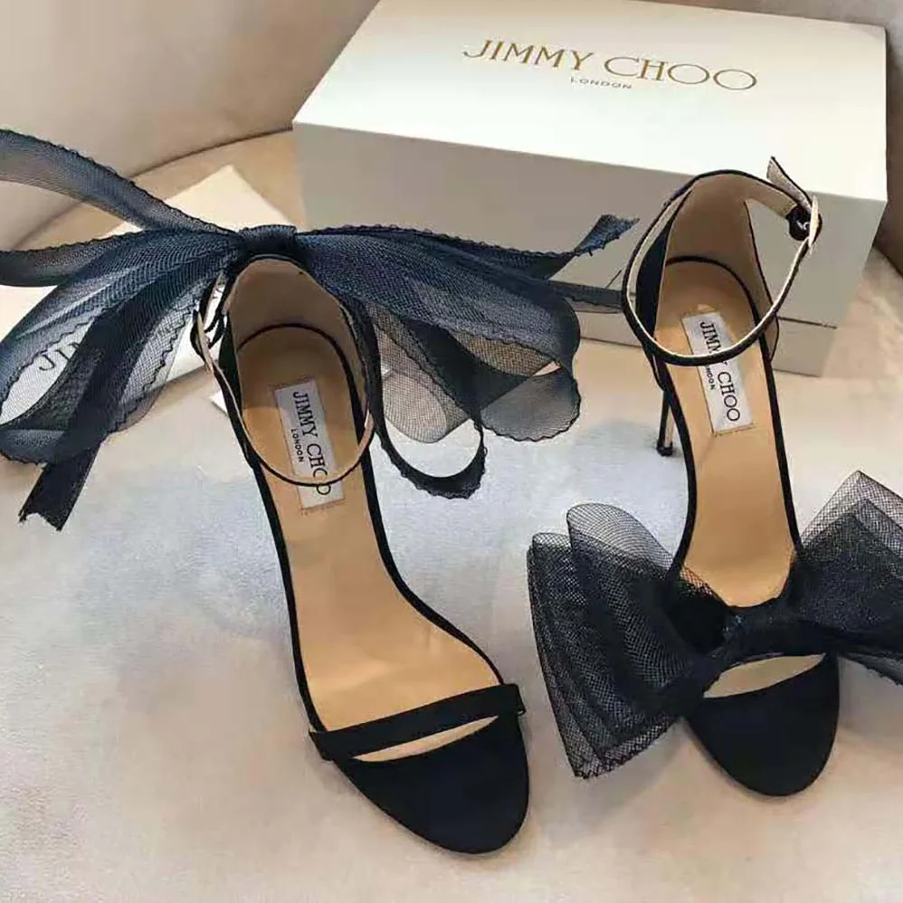 Jimmy Choo Aveline 100 Black Sandals with Asymmetric Grosgrain Mesh Fascinator Bows for Women Jimmy Choo Aveline 100 Black Sandals with Asymmetric Grosgrain Mesh Fascinator Bows for Women