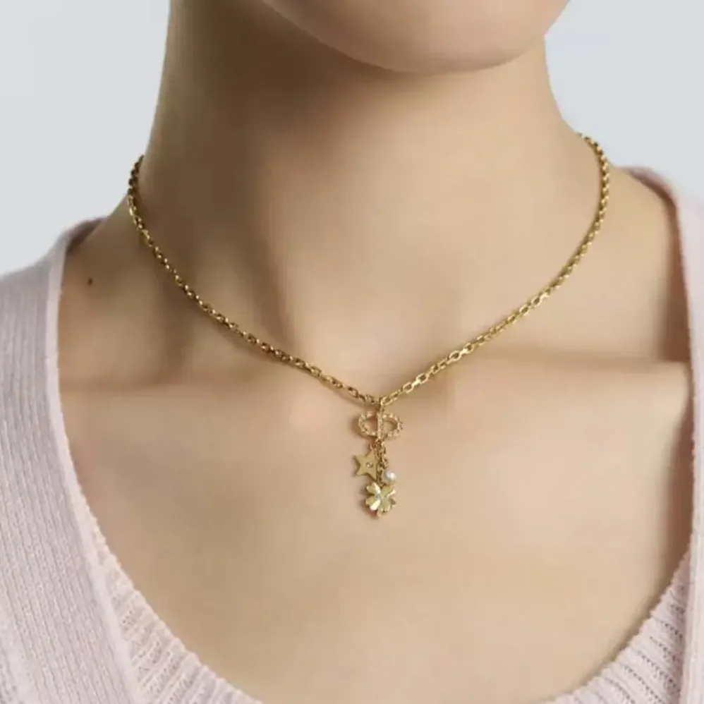 Dior Petit CD Lucky Charms Necklace Gold-Finish Metal with a White Resin Pearl and Silver for Women in Tone Crystals Dior Petit CD Lucky Charms Necklace Gold-Finish Metal with a White Resin Pearl and Silver for Women in Tone Crystals