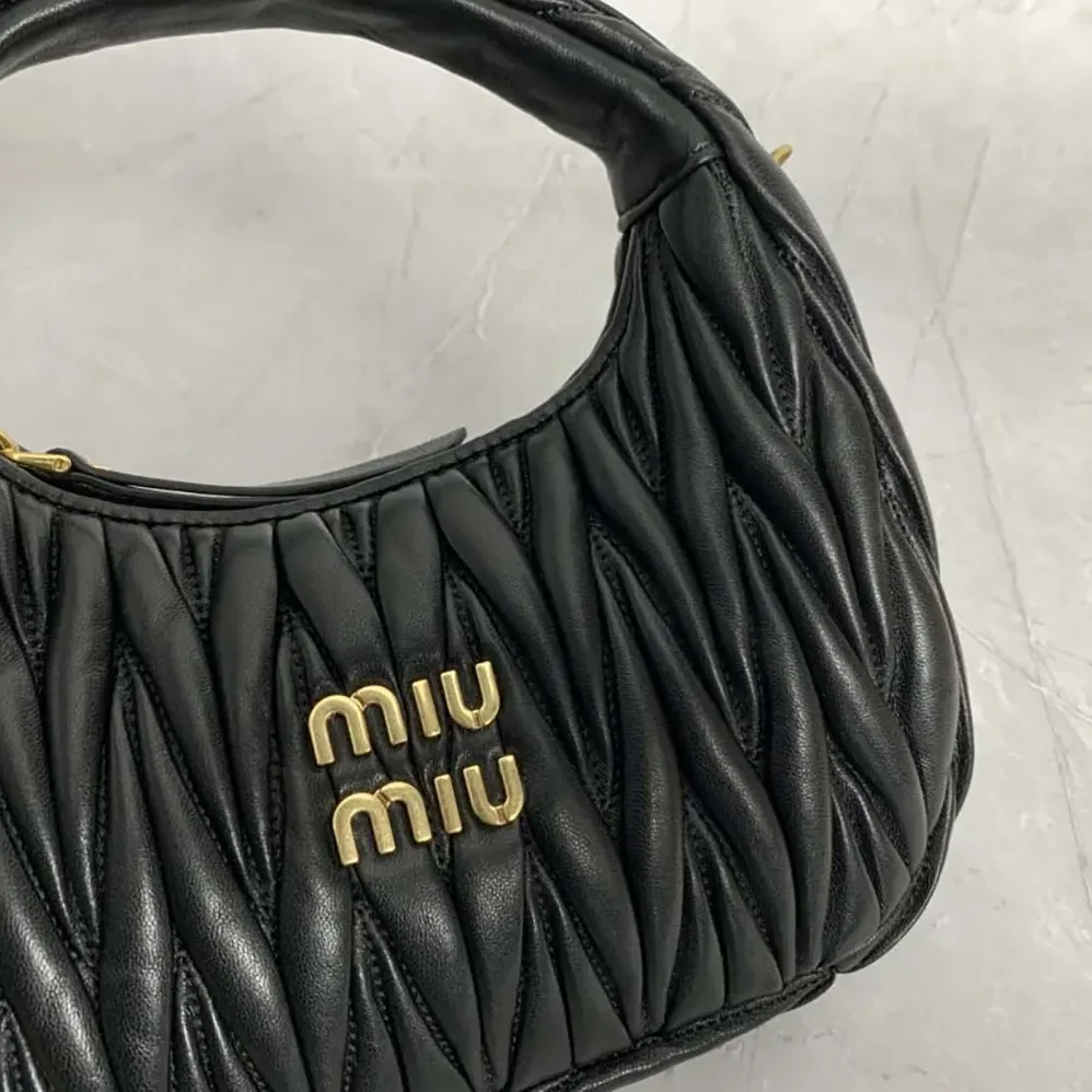 Miu Miu Wander Matelassé Nappa Leather Hobo Bag for Women in Black Miu Miu Wander Matelassé Nappa Leather Hobo Bag for Women in Black