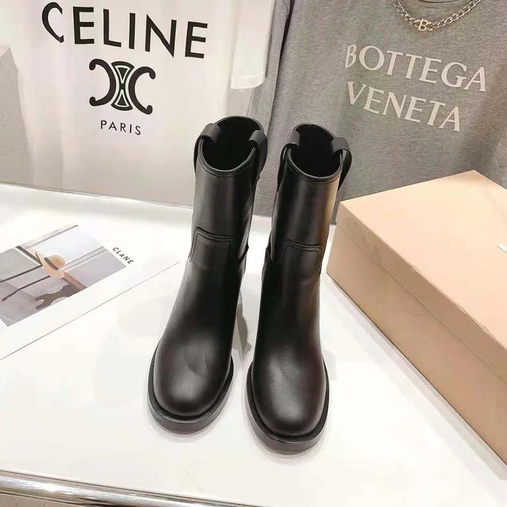 Miu Miu Leather Booties with Hot-stamped Logo for Women in Black