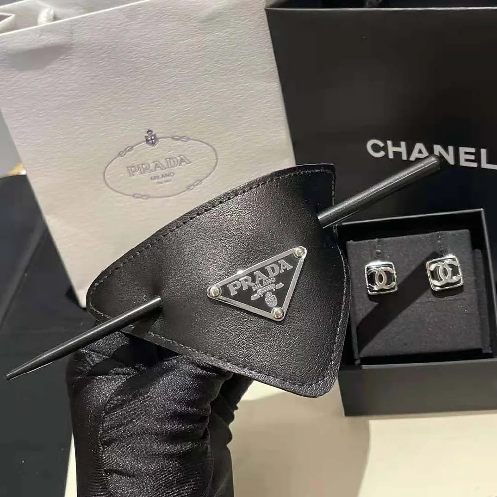 Prada Leather Hair Clip is Decorated with the Prada Logo for Women