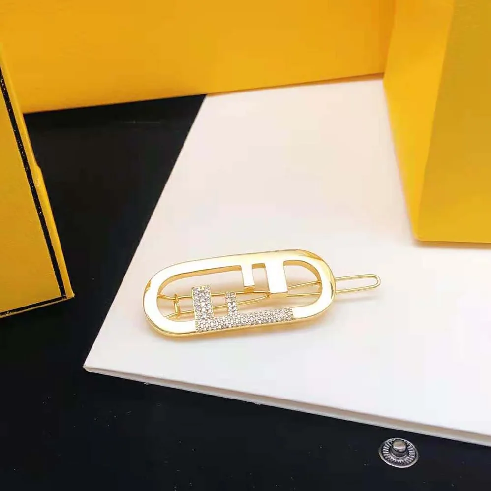 Fendi O'Lock Hair Clip Gold for Women in Coloured Fendi O'Lock Hair Clip Gold for Women in Coloured