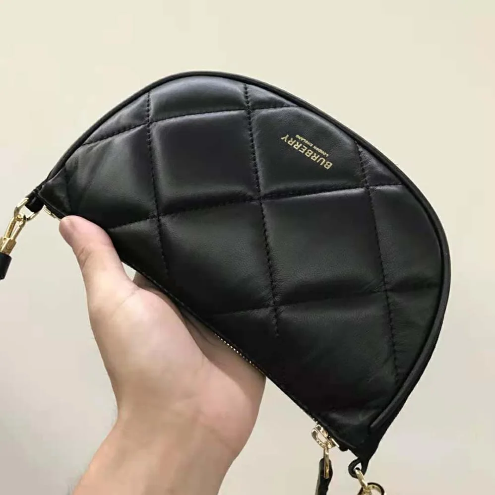 Burberry Quilted Lambskin Olympia Pouch for Women in Black Burberry Quilted Lambskin Olympia Pouch for Women in Black