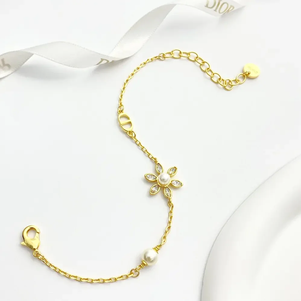 Dior Bloom in Dior Bracelet Gold-Finish Metal with White Resin Pearls and Silver for Women in Tone Crystals Dior Bloom in Dior Bracelet Gold-Finish Metal with White Resin Pearls and Silver for Women in Tone Crystals