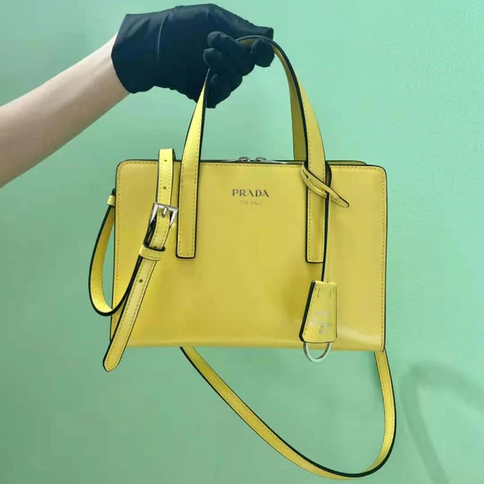 Prada Re-Edition 1995 Brushed-Leather Mini Handbag for Women in Yellow Prada Re-Edition 1995 Brushed-Leather Mini Handbag for Women in Yellow