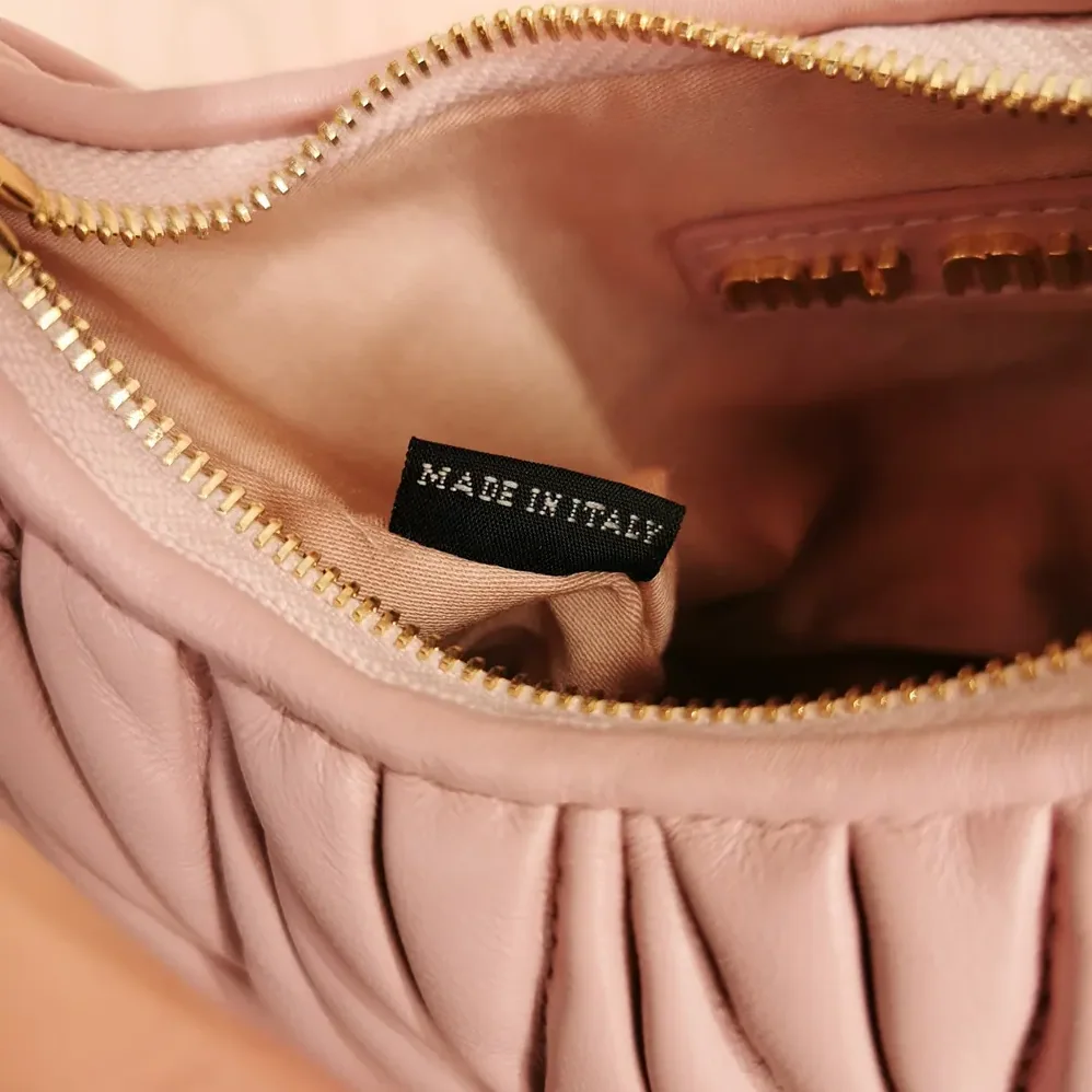 Miu Miu Wander Matelassé Nappa Leather Hobo Mini-Bag for Women in Powder Pink