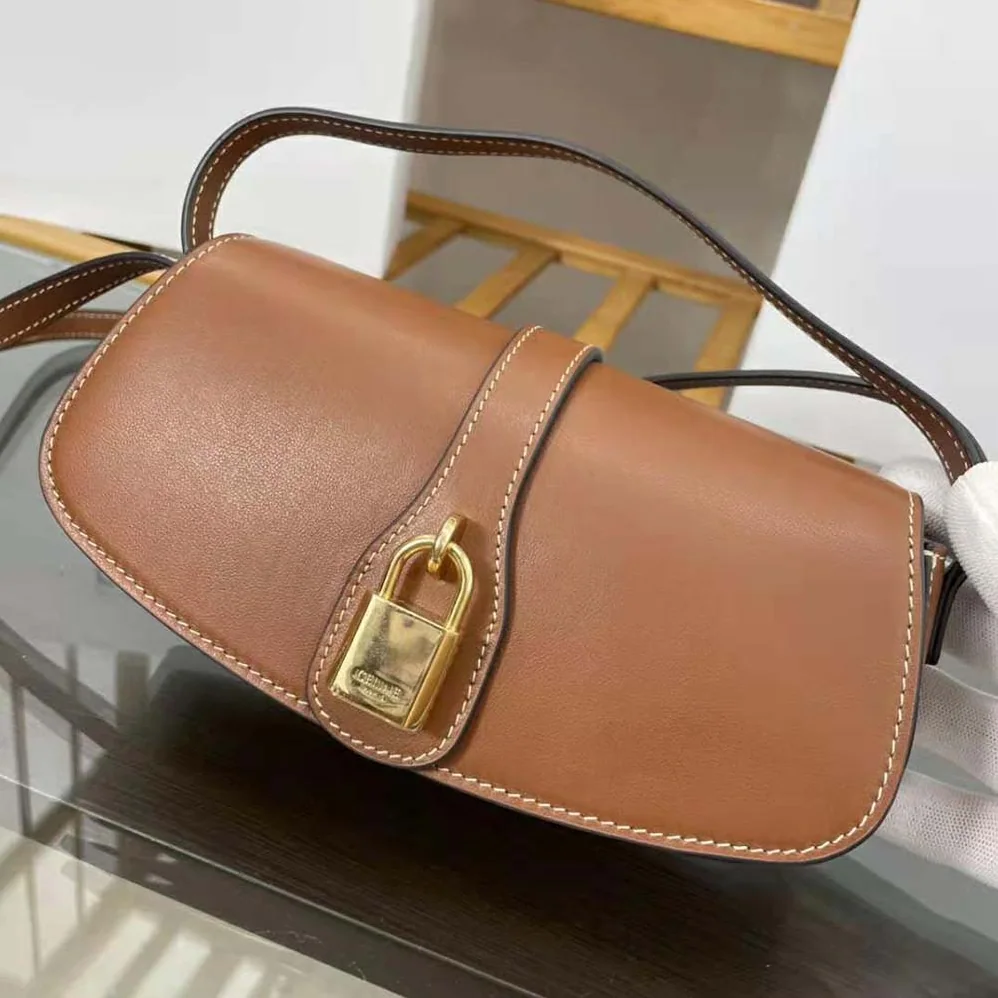 Celine Clutch on Strap in Smooth Calfskin for Women in Brown