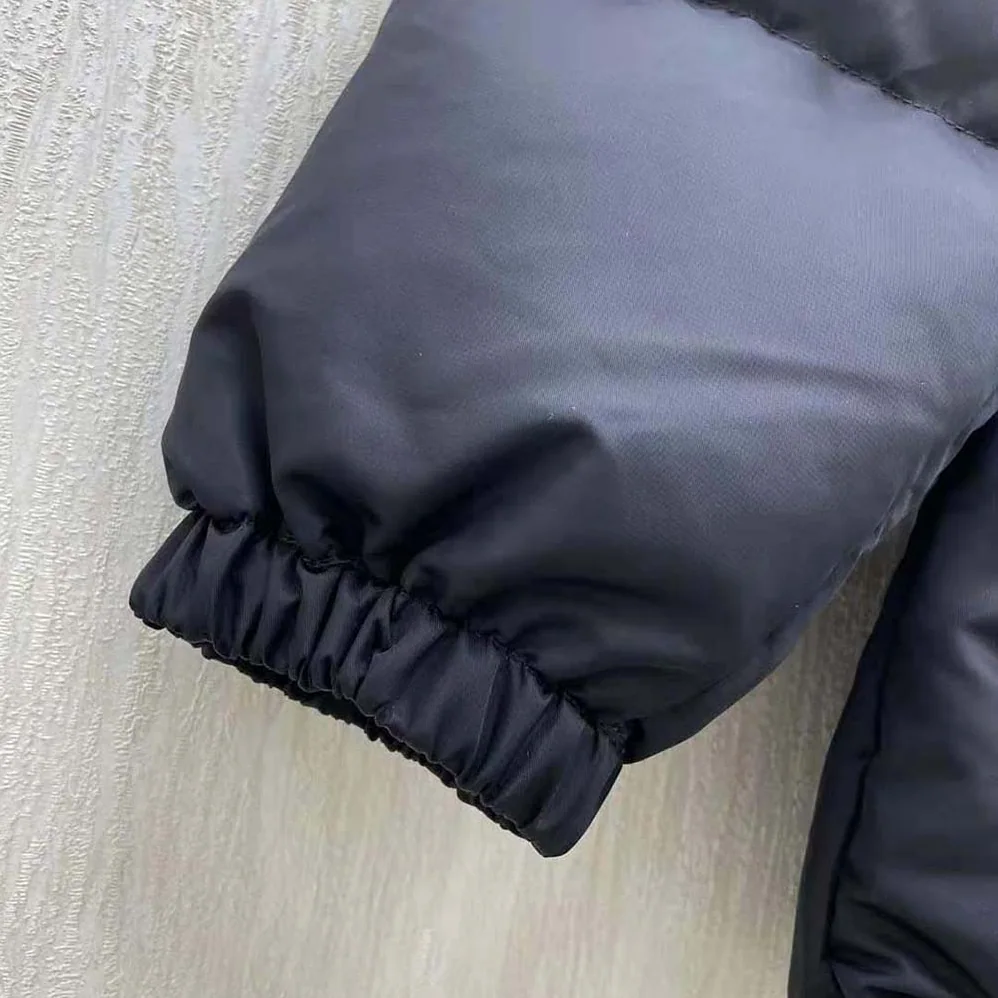 Prada Re-Nylon Down Jacket for Women in Black Prada Re-Nylon Down Jacket for Women in Black