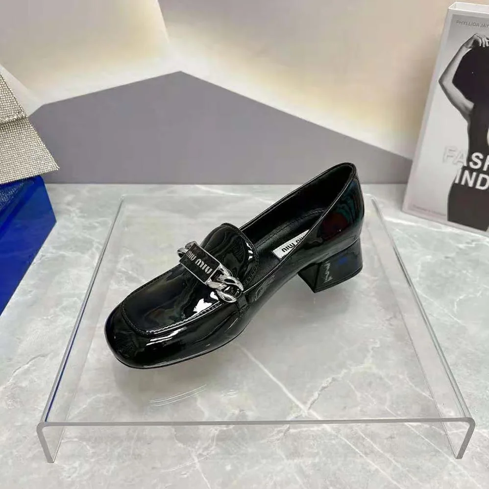 Miu Miu Patent Leather Loafers in 35 mm Heel Height for Women in Black