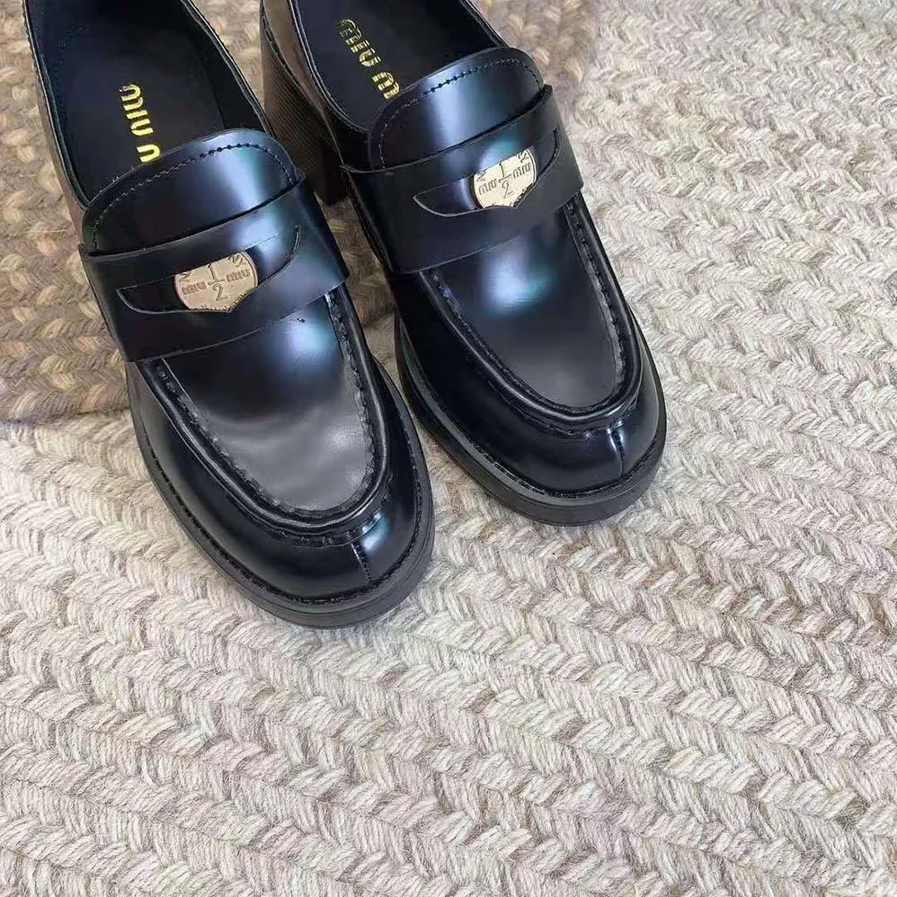 Miu Miu Leather Penny Loafers in 75mm Heel Height for Women in Black Miu Miu Leather Penny Loafers in 75mm Heel Height for Women in Black