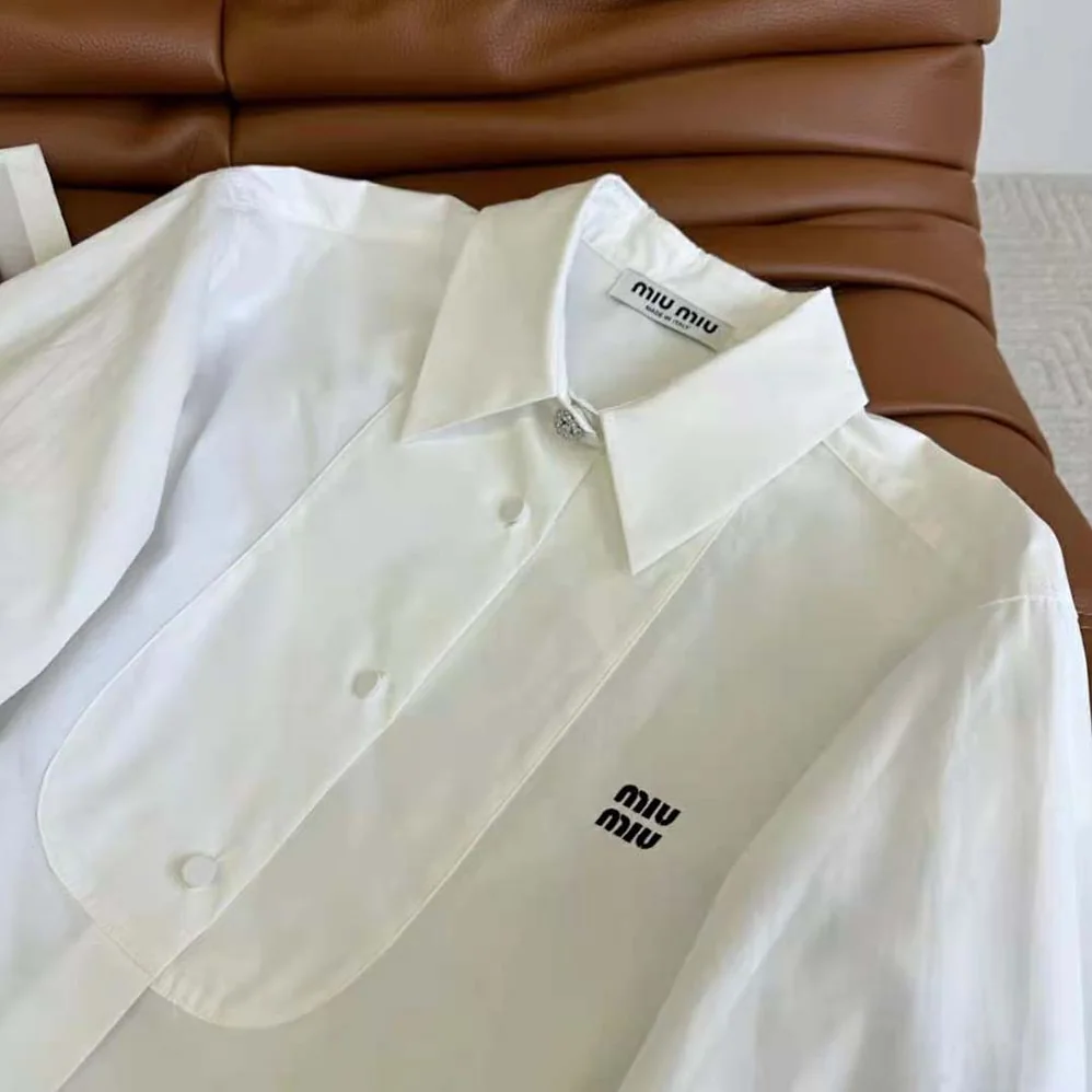 Miu Miu Poplin Shirt with Yarn-Embroidered Logo for Women in White Miu Miu Poplin Shirt with Yarn-Embroidered Logo for Women in White