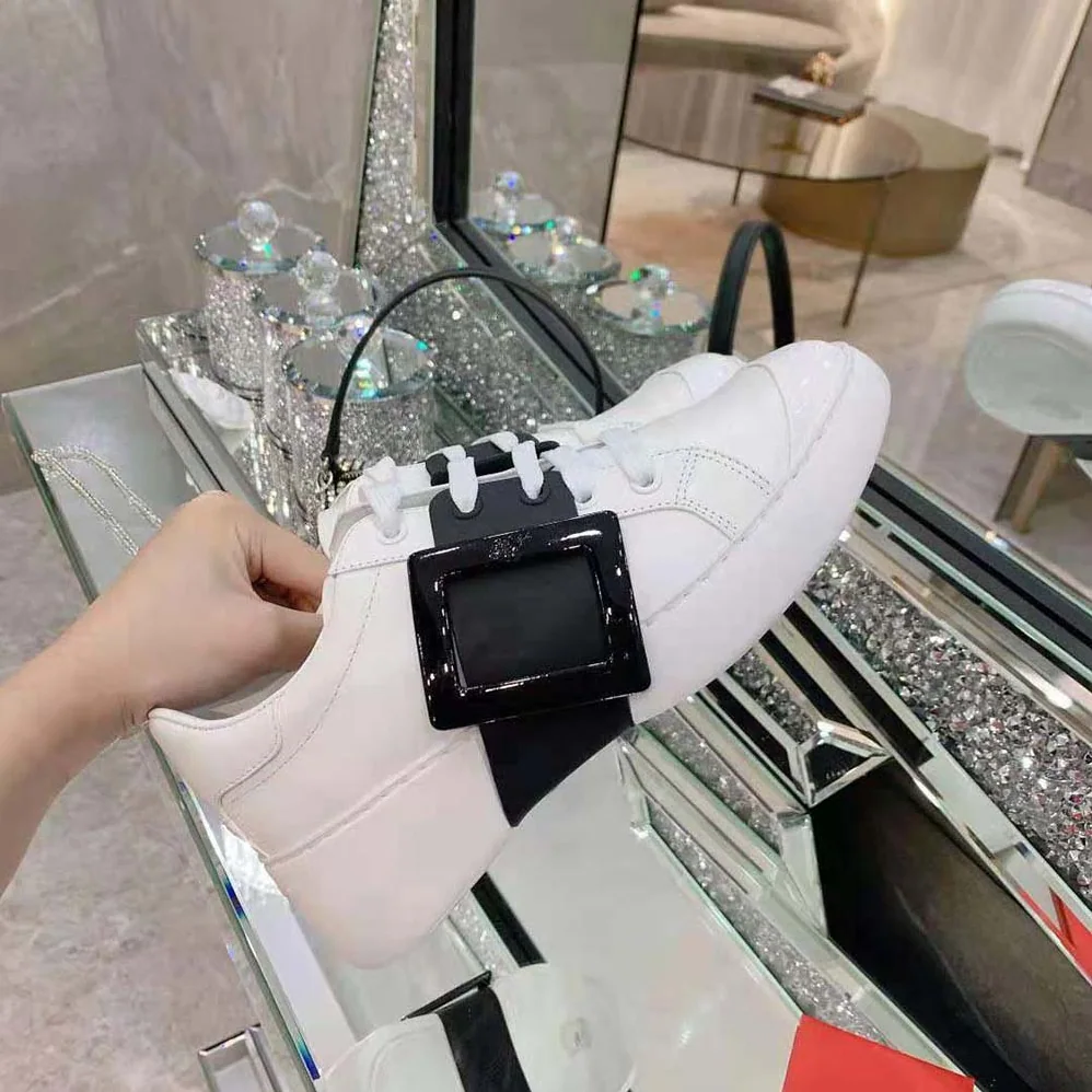 Roger Vivier Viv Skate Lacquered Buckle Sneakers in Soft Leather for Women in Black Roger Vivier Viv Skate Lacquered Buckle Sneakers in Soft Leather for Women in Black