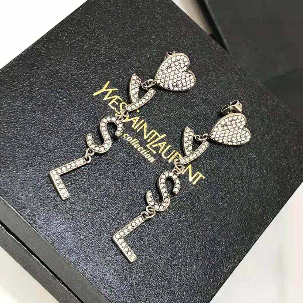 Saint Laurent YSL Opyum YSL Heart Earrings in Metal and Crystal for Women Saint Laurent YSL Opyum YSL Heart Earrings in Metal and Crystal for Women
