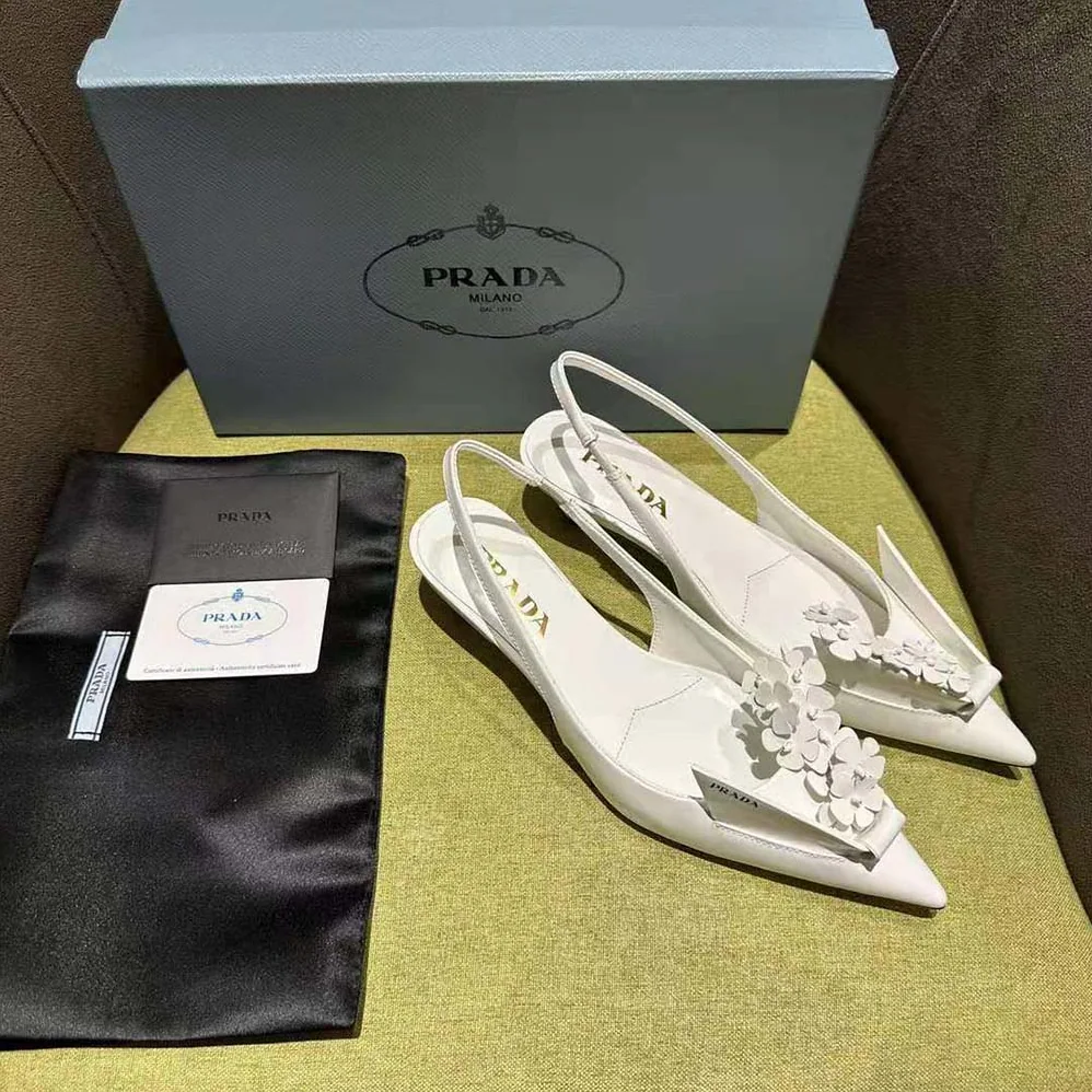 Prada Brushed Leather Slingback Pumps with Floral Appliques for Women in White Prada Brushed Leather Slingback Pumps with Floral Appliques for Women in White