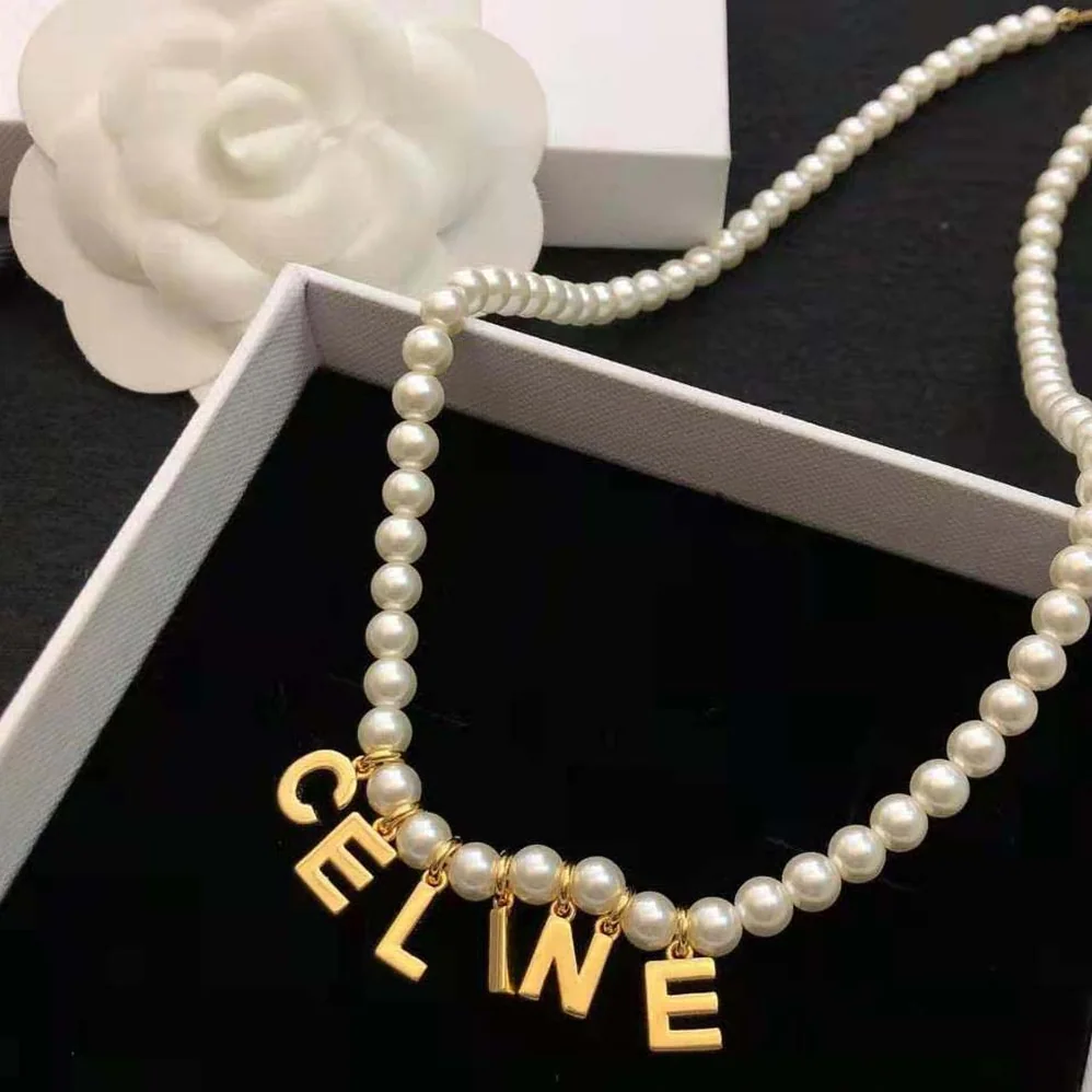 Celine Paris Pearl Bracelet in Brass with Gold Finish and Glass Pearls for Women Celine Paris Pearl Bracelet in Brass with Gold Finish and Glass Pearls for Women