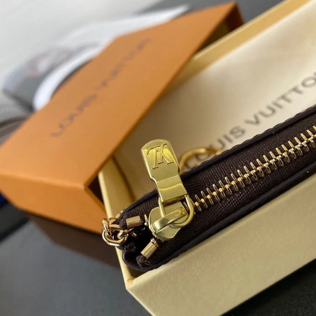 Louis Vuitton Key Pouch In Iconic Monogram Canvas Brown Louis Vuitton Key Pouch In Iconic Monogram Canvas Brown