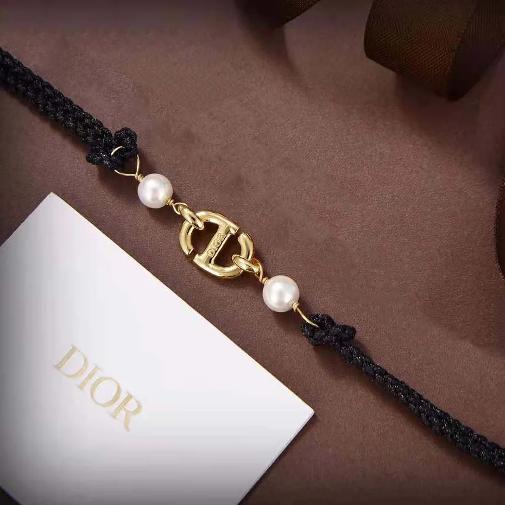 Dior CD Navy Bracelet Gold-Finish Metal with Black Cotton and White Resin Pearls for Women Dior CD Navy Bracelet Gold-Finish Metal with Black Cotton and White Resin Pearls for Women