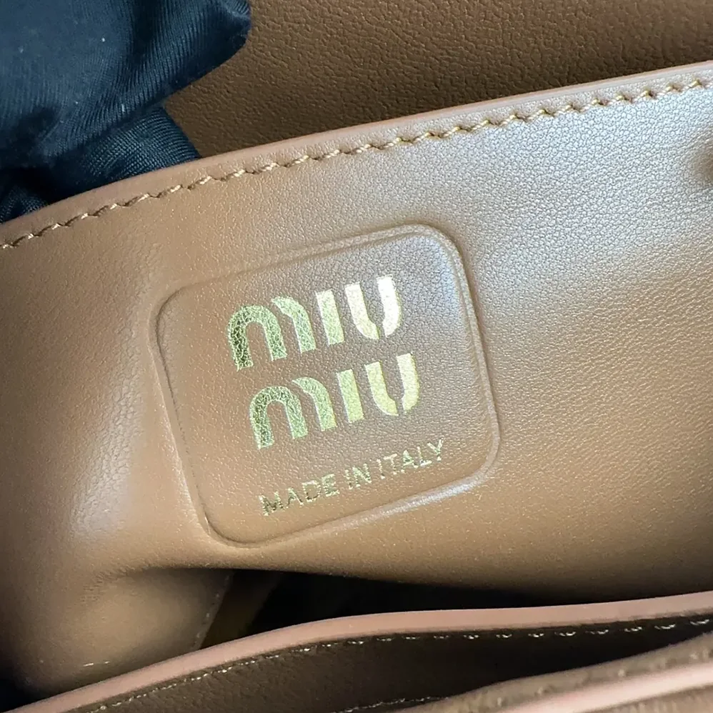 Miu Miu Matelassé Nappa Leather Shoulder Bag for Women in Brown