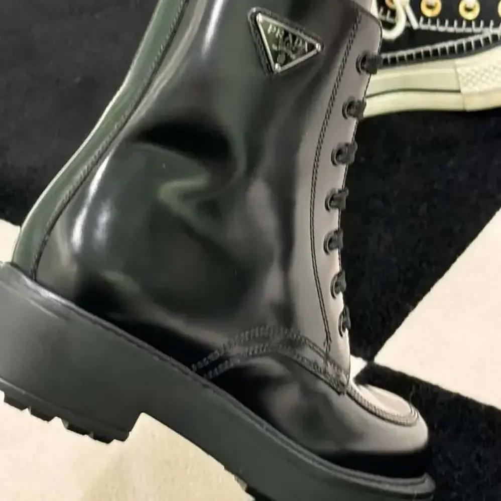 Prada Brushed Leather Combat Boots for Unisex in Black