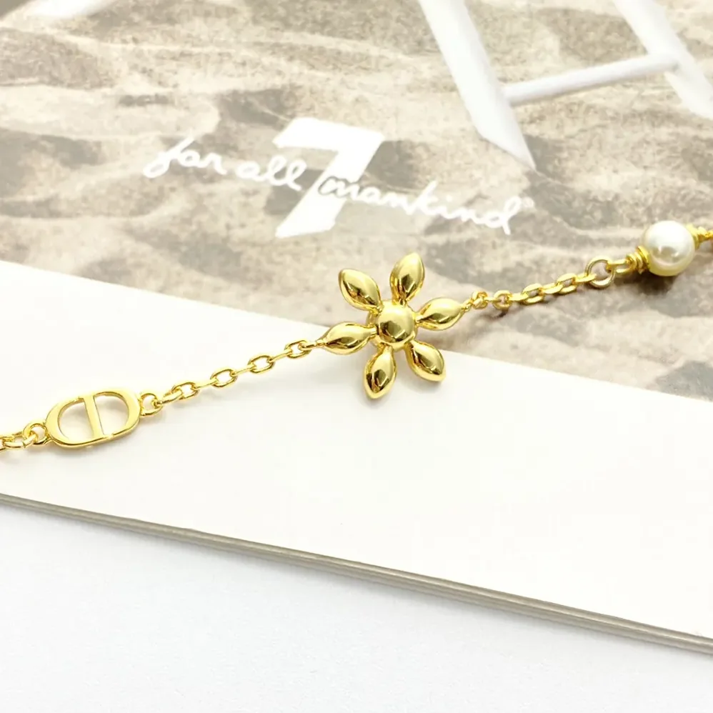 Dior Bloom in Dior Bracelet Gold-Finish Metal with White Resin Pearls and Silver for Women in Tone Crystals Dior Bloom in Dior Bracelet Gold-Finish Metal with White Resin Pearls and Silver for Women in Tone Crystals