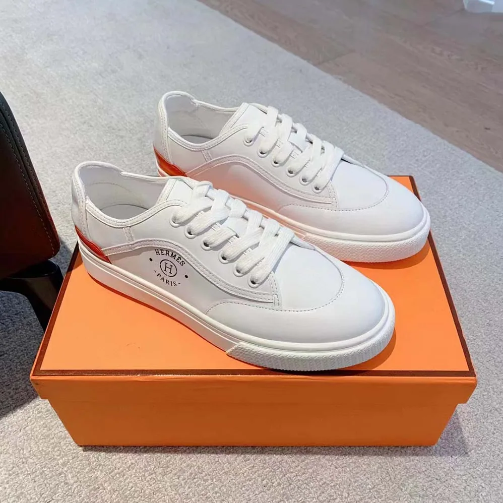 Hermes Get Sneaker in Calfskin with Signature “Hermès Paris” Stencil for Unisex in White Hermes Get Sneaker in Calfskin with Signature “Hermès Paris” Stencil for Unisex in White