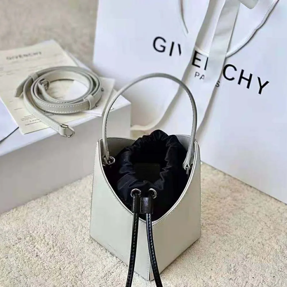 Givenchy Mini Cut Out Bucket Bag in Box Leather for Women in White Givenchy Mini Cut Out Bucket Bag in Box Leather for Women in White