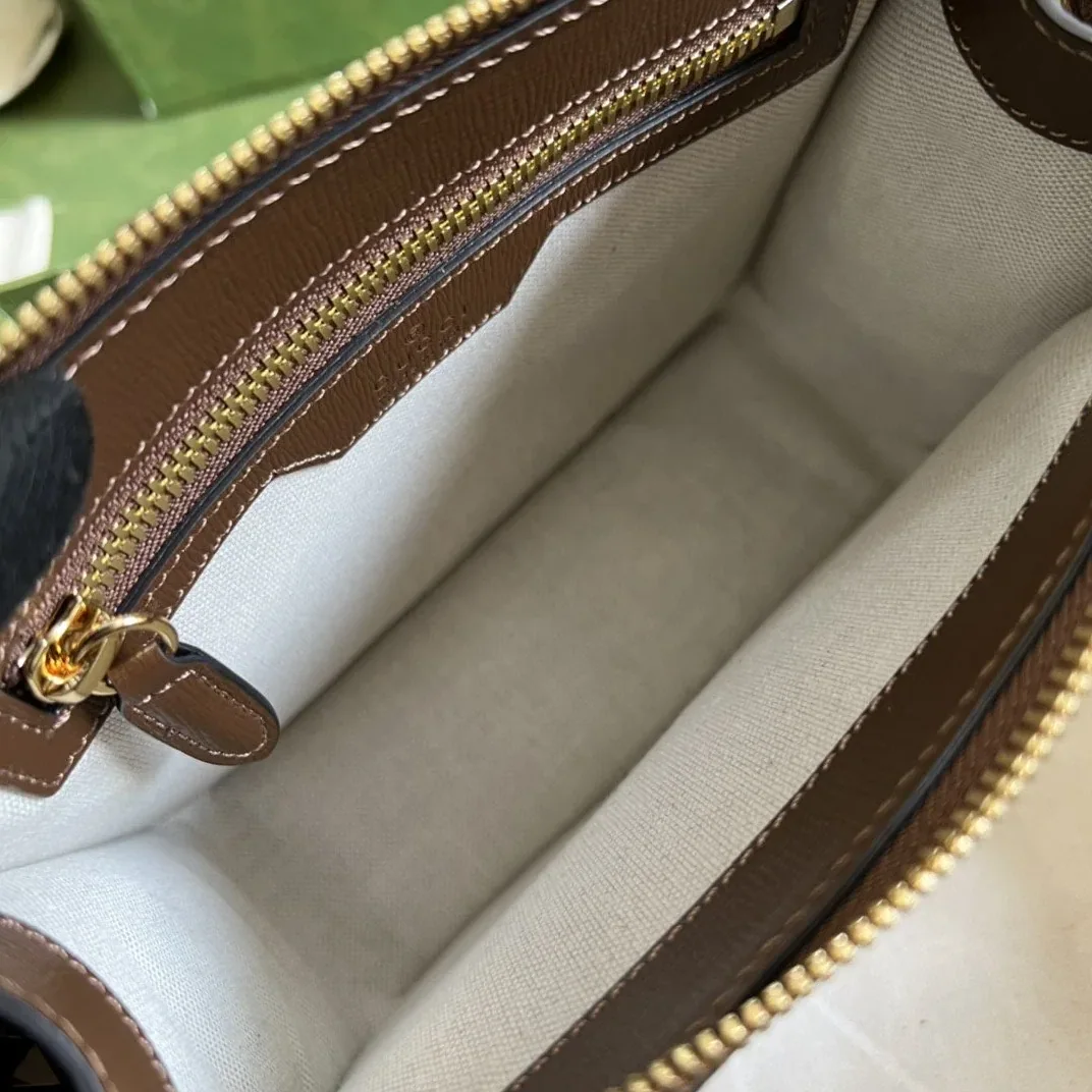 Gucci Messenger Bag With Interlocking G Beige And Ebony GG Supreme Canvas And Brown / GG 92THG Gucci Messenger Bag With Interlocking G Beige And Ebony GG Supreme Canvas And Brown / GG 92THG