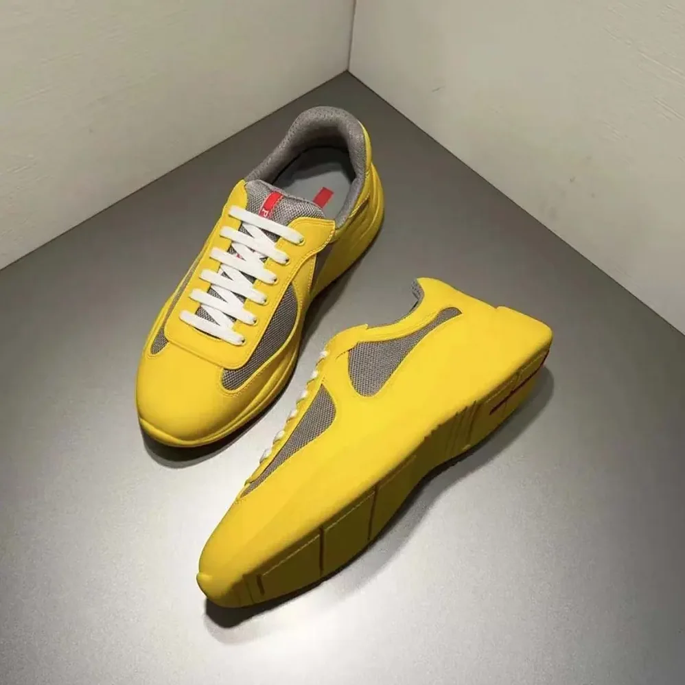 Prada America's Cup Soft Rubber and Bike Fabric Sneakers for Unisex in Yellow Prada America's Cup Soft Rubber and Bike Fabric Sneakers for Unisex in Yellow