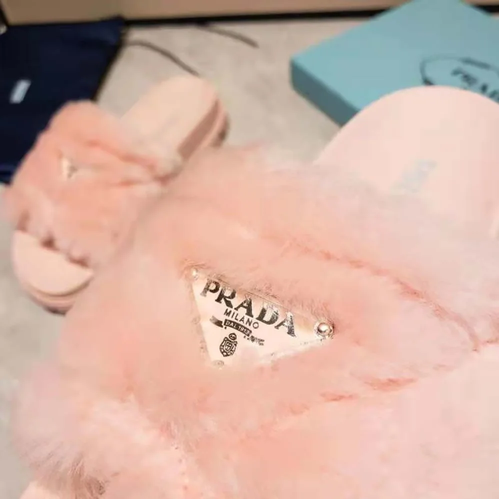 Prada Shearling Slides in 20mm Heel for Women in Pink Prada Shearling Slides in 20mm Heel for Women in Pink