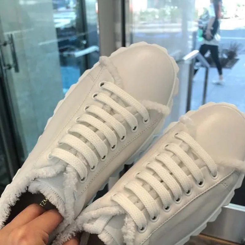 Stuart Weitzman The Fringiecoverstory Sneaker 25mm Heel Height for Women in White Stuart Weitzman The Fringiecoverstory Sneaker 25mm Heel Height for Women in White