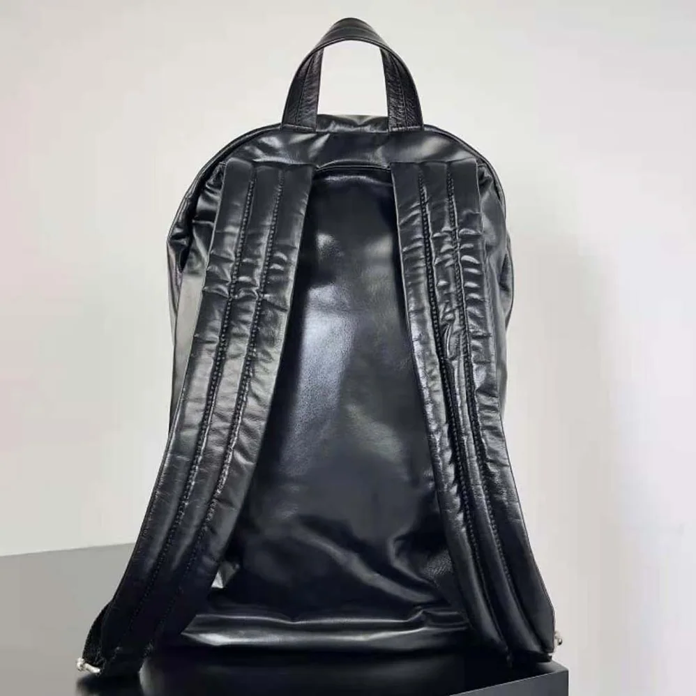 Bottega Veneta Medium Archetype Backpack Crafted from Supple Lambskin Leather for Men in Black