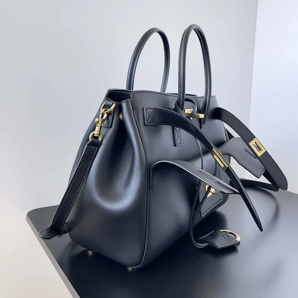 Balenciaga Bel Air Small Carry All Bag in Black Smooth Calfskin for Women in Gold Balenciaga Bel Air Small Carry All Bag in Black Smooth Calfskin for Women in Gold