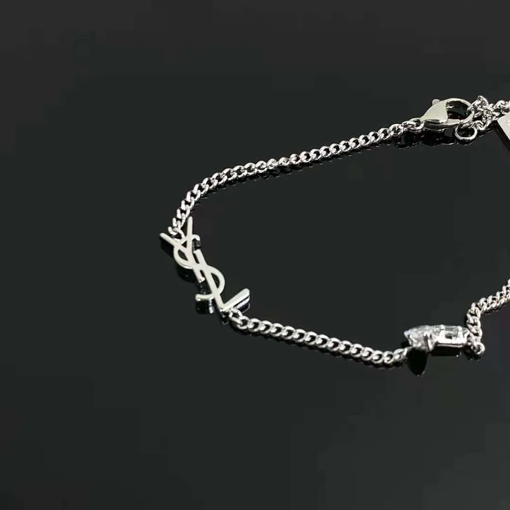 Saint Laurent YSL Opyum Charm Bracelet in Metal and Rhinestone for Women Saint Laurent YSL Opyum Charm Bracelet in Metal and Rhinestone for Women
