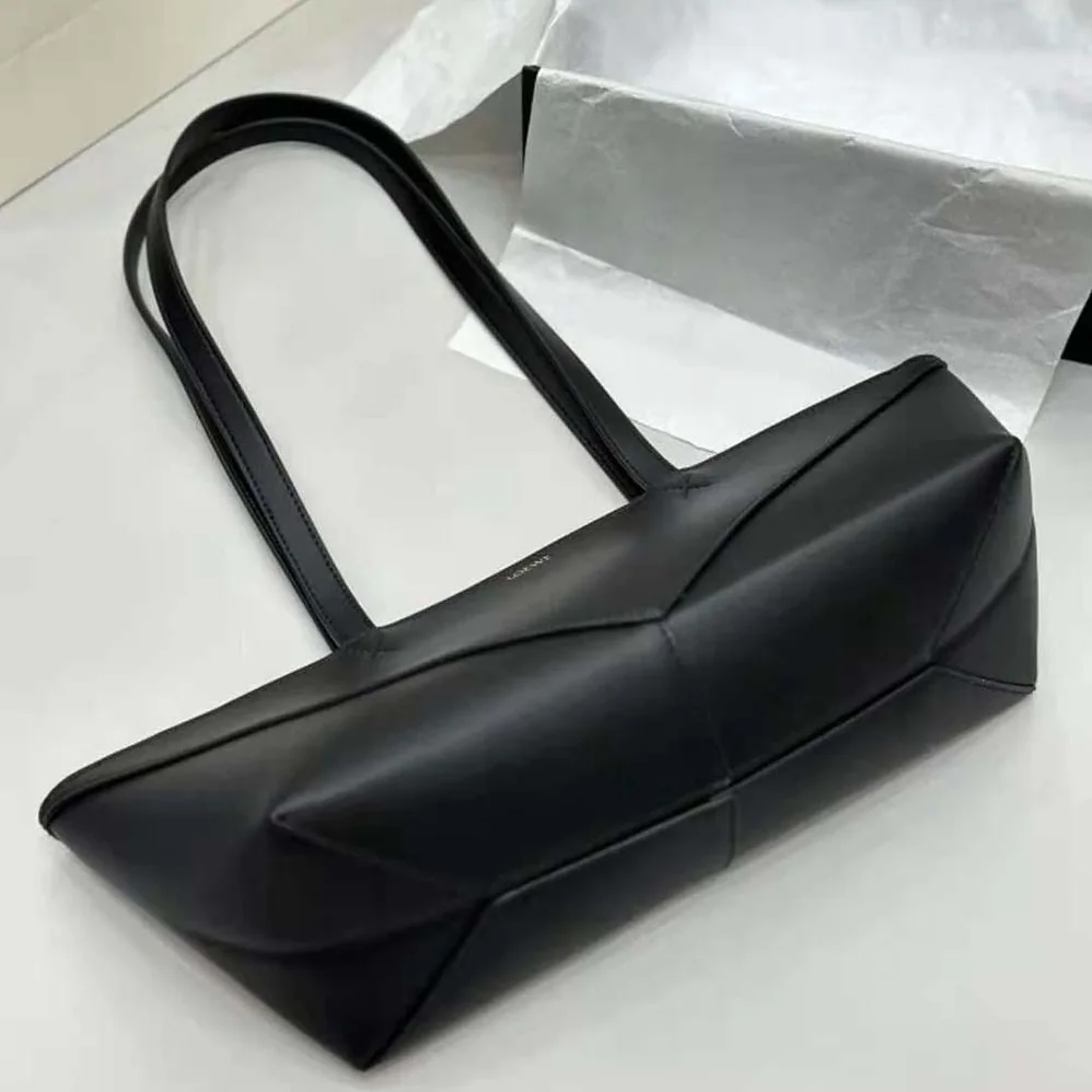 Loewe Cropped Puzzle Fold Bag in Shiny Calfskin for Women in Black Loewe Cropped Puzzle Fold Bag in Shiny Calfskin for Women in Black
