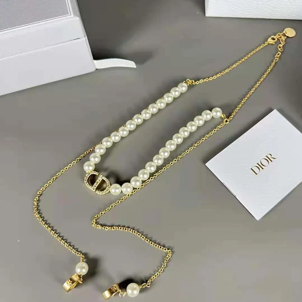 Dior Petit CD Necklace for Headphones Gold for Women in Finish Metal Dior Petit CD Necklace for Headphones Gold for Women in Finish Metal