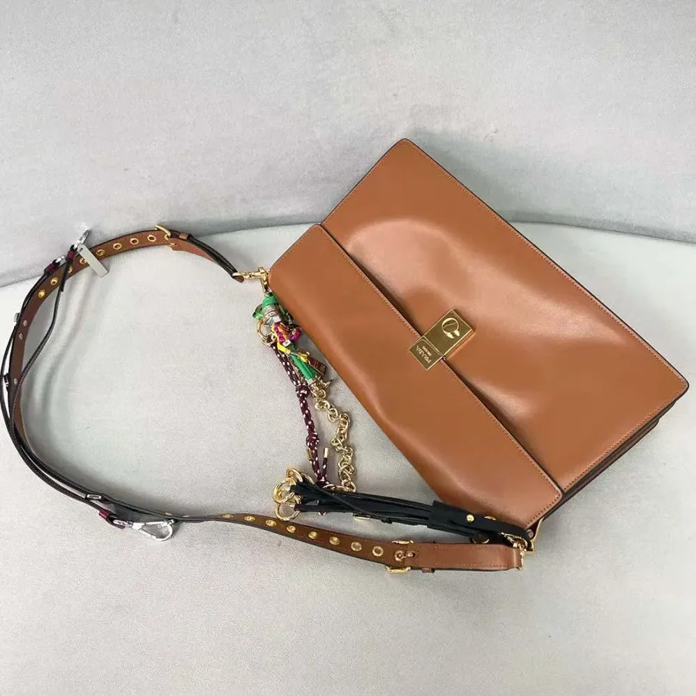 Prada Soft Sound Large Leather Shoulder Bag with Charms for Women in Brown