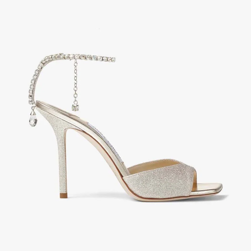 Jimmy Choo Saeda Sandal 100 Platinum Ice Dusty Glitter Sandals with Crystal Embellishment for Women Jimmy Choo Saeda Sandal 100 Platinum Ice Dusty Glitter Sandals with Crystal Embellishment for Women