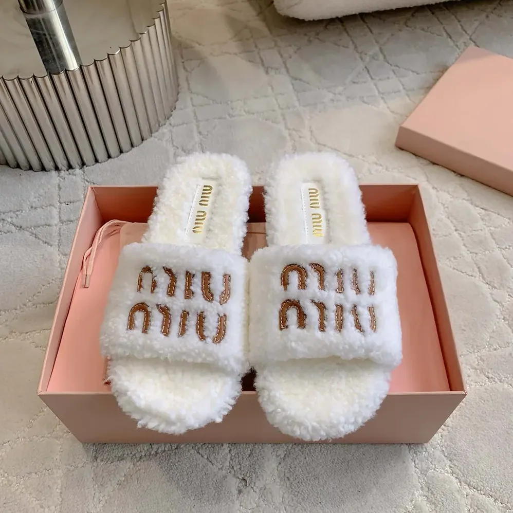 Miu Miu Shearling Slides with Leather Logo for Women