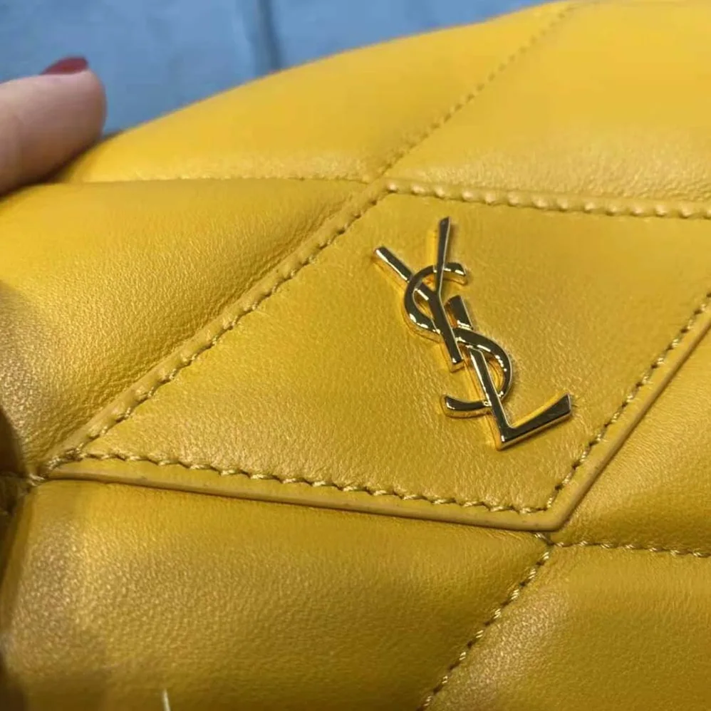 Saint Laurent YSL Sade Puffer Envelope Clutch in Lambskin for Women in Yellow Saint Laurent YSL Sade Puffer Envelope Clutch in Lambskin for Women in Yellow
