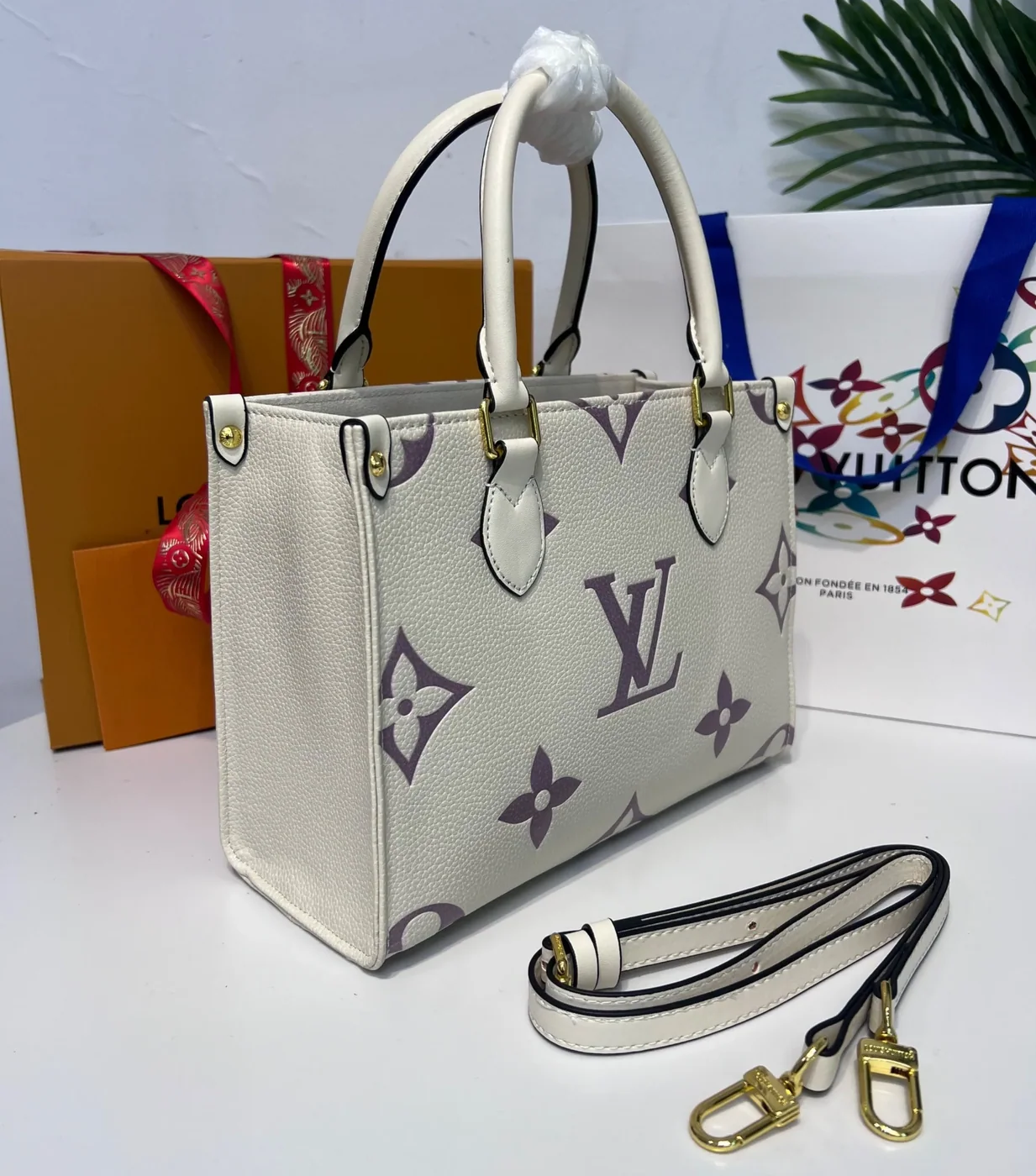 Louis Vuitton Onthego PM Tote Bag in Grey/Beige Gold Hardware