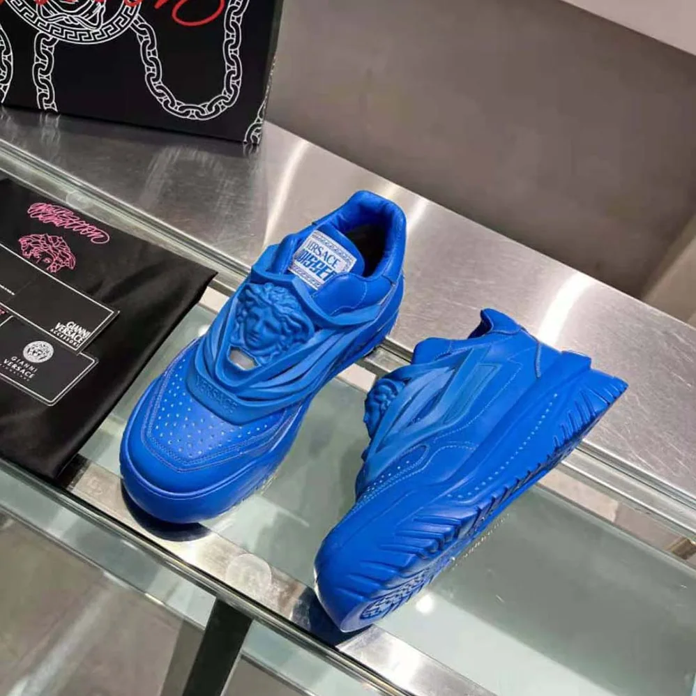 Versace Odissea Sneakers are Set on Rubber Soles with Perforated Toe Caps for Unisex in Blue Versace Odissea Sneakers are Set on Rubber Soles with Perforated Toe Caps for Unisex in Blue