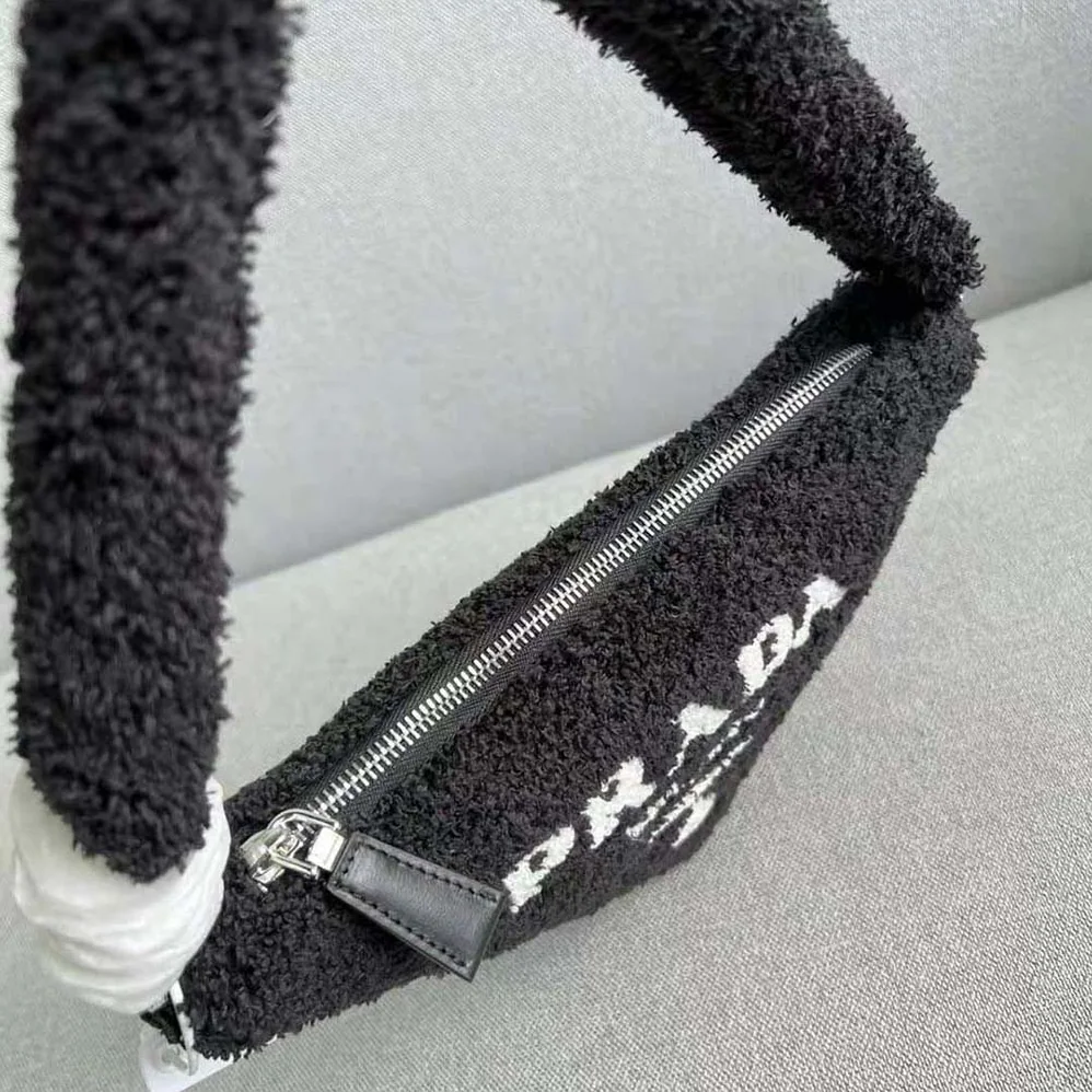 Prada Terrycloth Pouch with Embroidered Lettering Logo for Women in Black Prada Terrycloth Pouch with Embroidered Lettering Logo for Women in Black