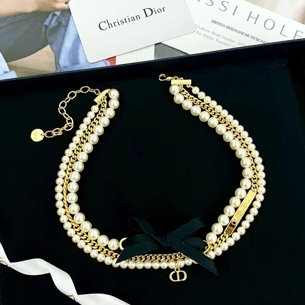 Dior Le Nœud de Dior Choker Gold-Finish Metal with White Resin Pearls and Black Satin for Women Dior Le Nœud de Dior Choker Gold-Finish Metal with White Resin Pearls and Black Satin for Women