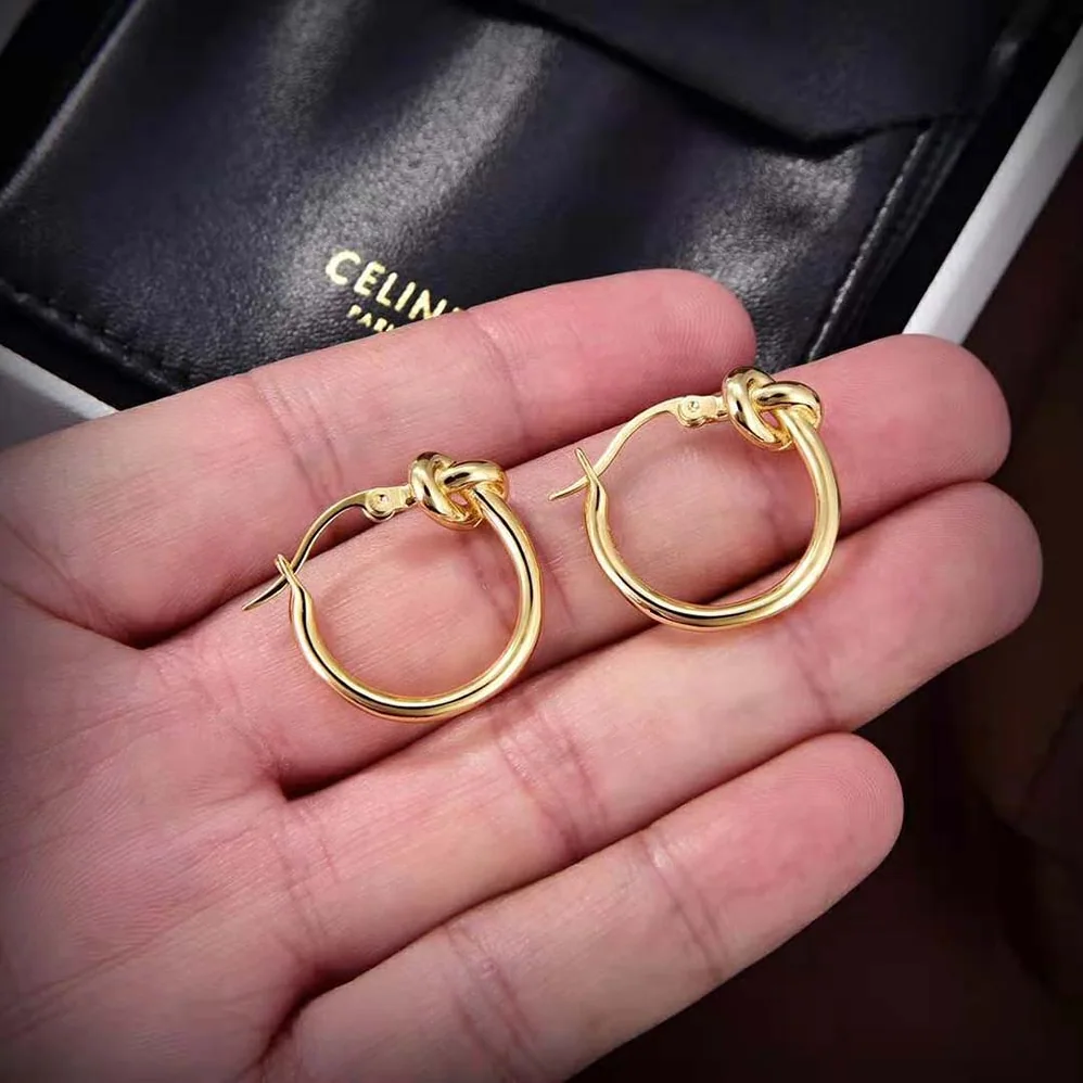Celine Knot Small Hoops in Brass with Gold Finish for Women Celine Knot Small Hoops in Brass with Gold Finish for Women