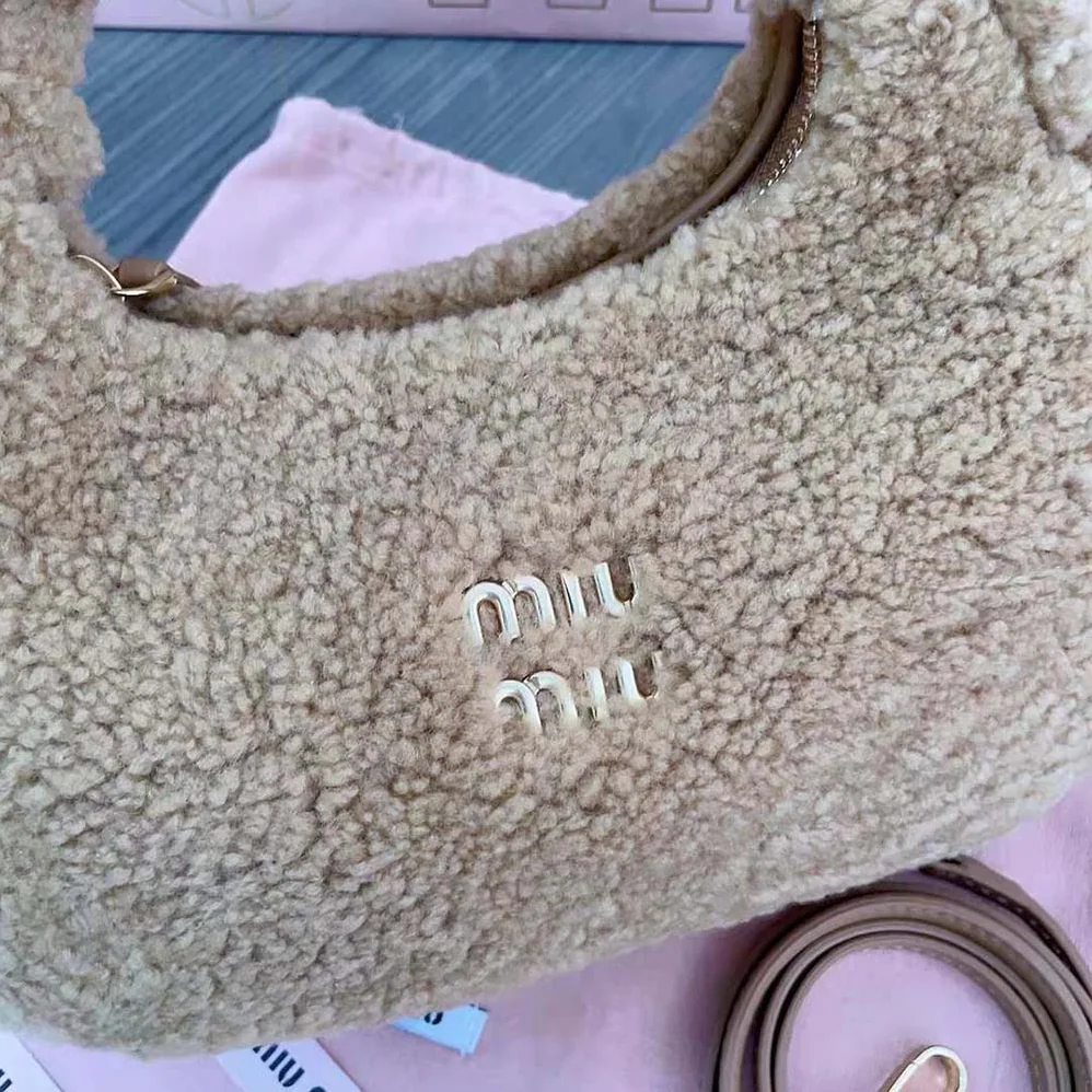 Miu Miu Wander Shearling Hobo Bag with Leather Details for Women in Sandy