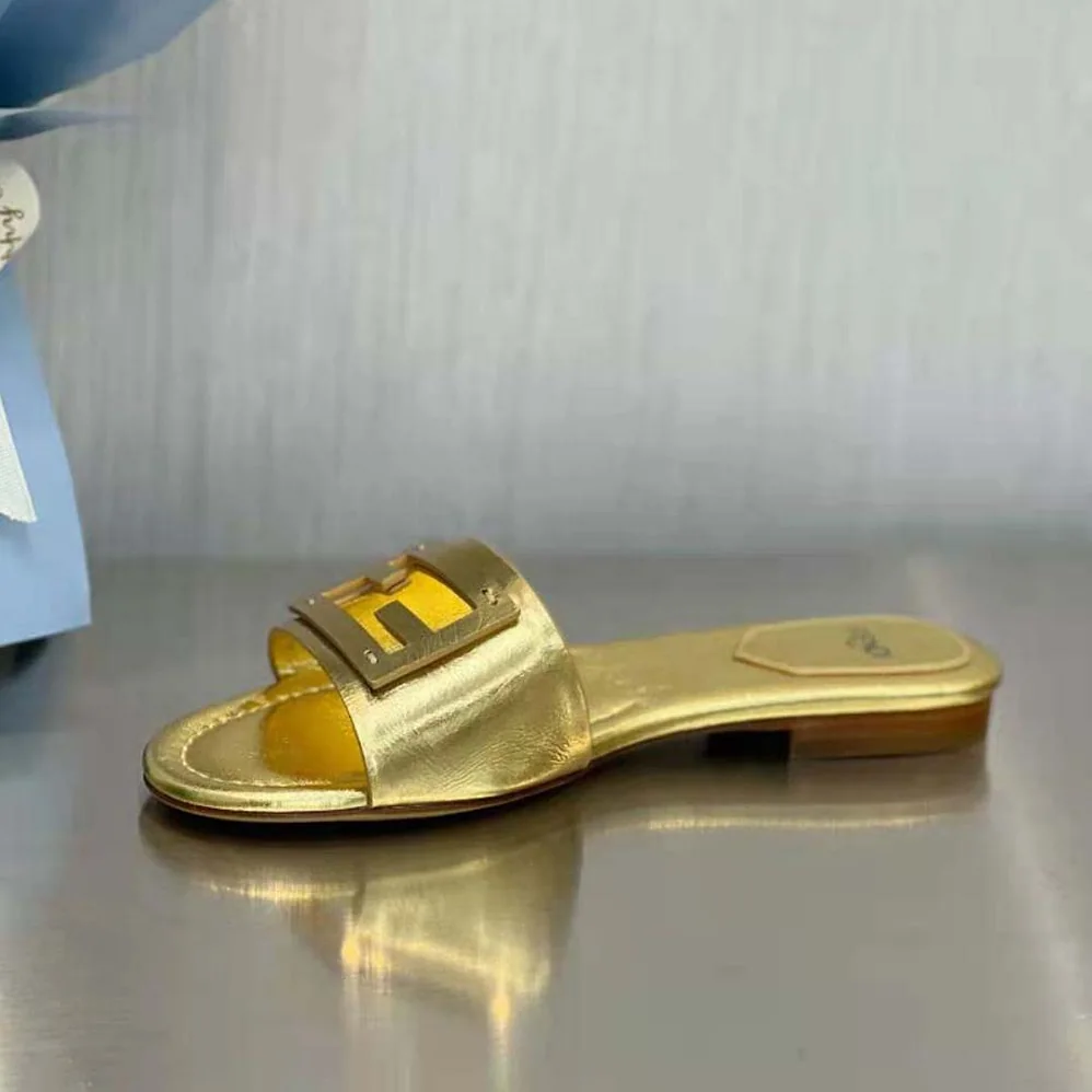 Fendi Baguette Gold Nappa Leather Slides for Women Fendi Baguette Gold Nappa Leather Slides for Women