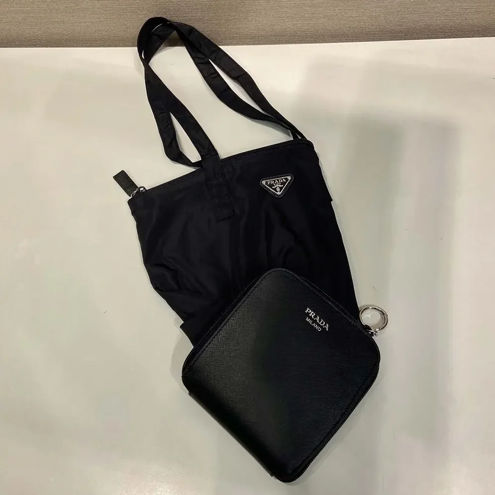 Prada Saffiano Leather Pendant With Re-Nylon Tote Bag for Women in Black Prada Saffiano Leather Pendant With Re-Nylon Tote Bag for Women in Black