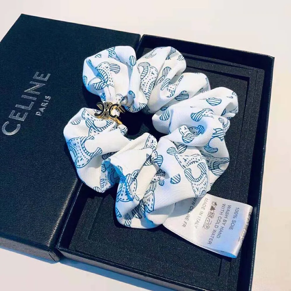Celine Scrunchy Celine Triomphe Toile De Jouy Bracelet in Brass with Gold Finish and White and Navy Silk for Women Celine Scrunchy Celine Triomphe Toile De Jouy Bracelet in Brass with Gold Finish and White and Navy Silk for Women