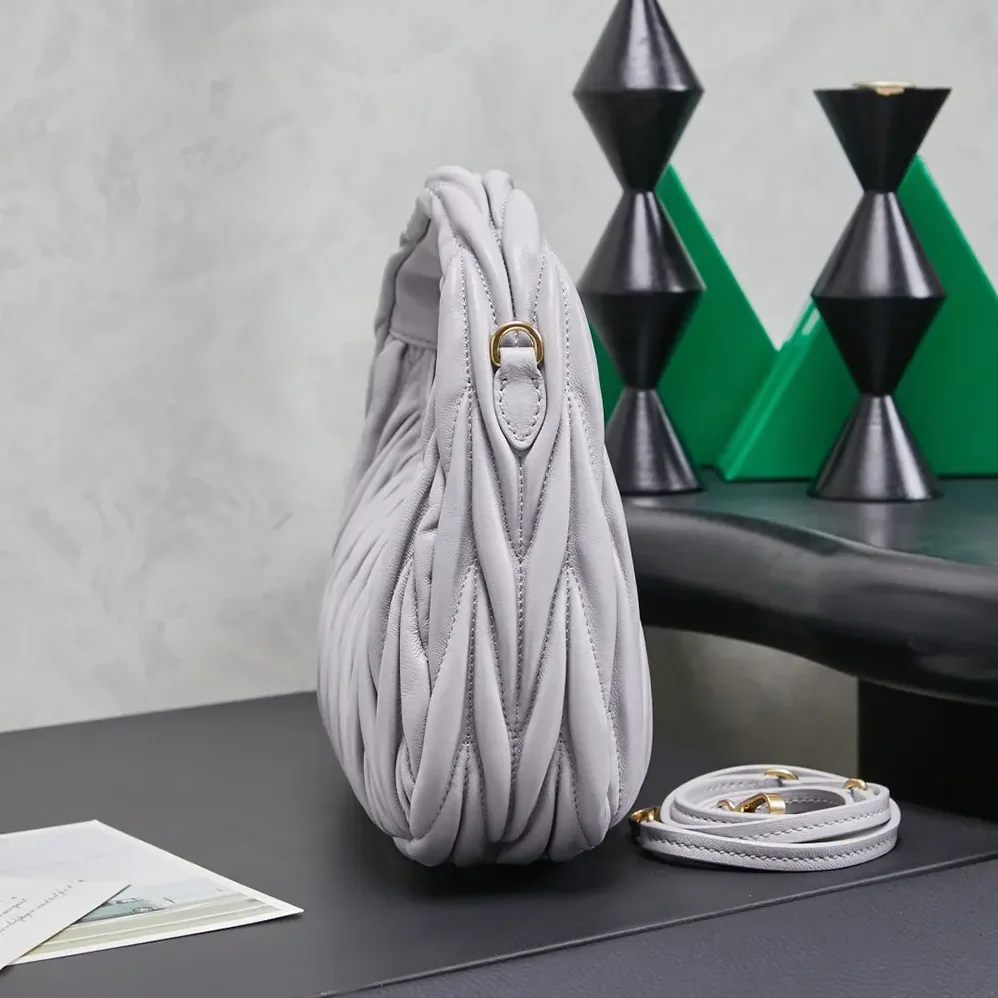Miu Miu Wander Matelassé Nappa Leather Hobo Bag for Women in Wisteria Miu Miu Wander Matelassé Nappa Leather Hobo Bag for Women in Wisteria