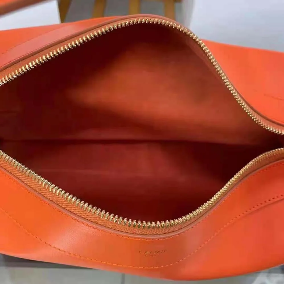 Celine Medium Romy in Supple Calfskin for Women in Orange Celine Medium Romy in Supple Calfskin for Women in Orange